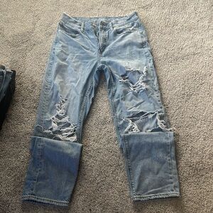 Women’s distressed straight leg Jean